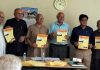 Members of Samaj Kalyan Kendra releasing brochure during AGM in Jammu.