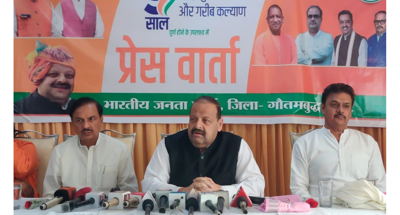 Senior BJP leader Devender Singh Rana addressing a press conference at Noida. Dr Mahesh Sharma Former Union Minister and MP (LS) and Surinder Nagar MP (LS) Gautam Budh Nagar are also seen in the picture.
