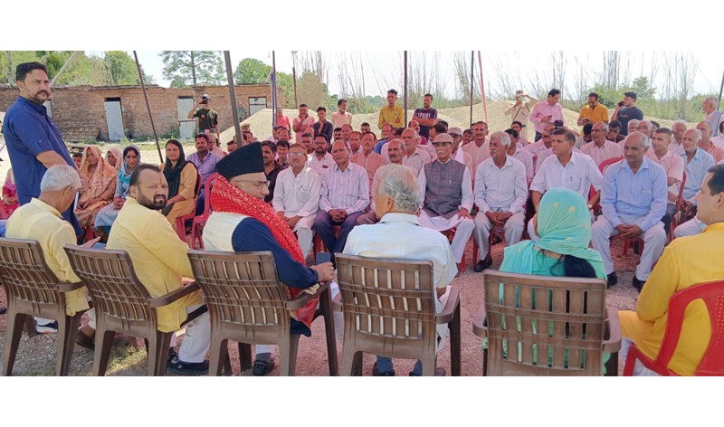 BJP MP Er Gulam Ali Khatana addressing a public gathering at Pargwal on Friday.