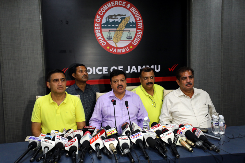 President Chamber of Commerce, Arun Gupta along with other office bearers addressing press conference at Jammu on Thursday.— Excelsior/Rakesh