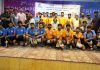 Players posing during closing ceremony with dignitaries at NIT Srinagar.
