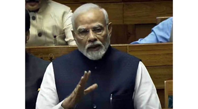 Prime Minister Narendra Modi speaks in the Lok Sabha during special session of the Parliament, in New Delhi on Thursday. (UNI)