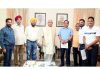 Lt Governor Manoj Sinha during meeting with Jammu Chamber of Hot Mix Plant Operators.