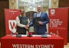 Dr. B.N Tripathi, VC SKUAST-J shakes hand with WSU VC & President, Prof. Barney Glover after signing a MoU.