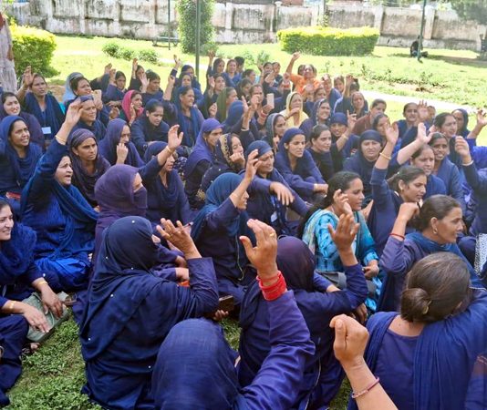 Asha workers staging protest against UT Government in Rajouri on Tuesday. -Excelsior/ Imran