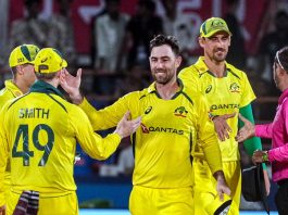 Australian players celebrate after winning the 3rd ODI against India at Saurashtra Cricket Association Stadium in Rajkot on Wednesday.