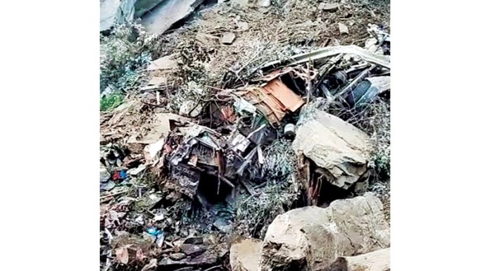 Mingled remains of a truck that fell into gorge in Ramban on Tuesday.