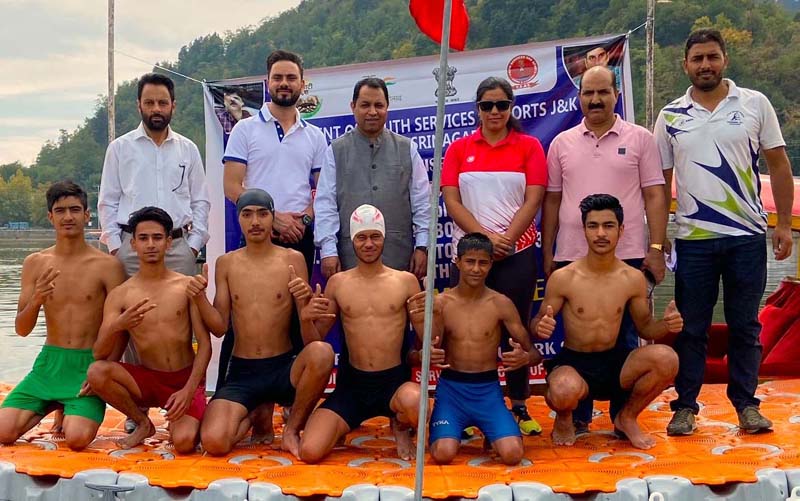 Swimmers posing with dignitaries during selection trials at Srinagar.
