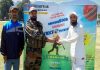 An Army officer presenting trophy to a player at Kishtwar.