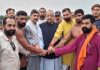 MP Jugal Kishore Sharma, Senior BJP leader, Devender Rana and team of Yuva Rajput Sabha posing with wrestlers in Nagrota constituency on Tuesday.