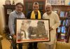 Members of Save Sharda Committee presenting a picture of Sharda temple to Dr Karan Singh.