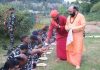 Bhandara being served to security personnel by Mahant Deependra Giri and his disciple at Pahalgam.