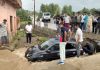 A car which washed away due to heavy rain in Mendhar area of Poonch on Sunday.
