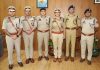 Newly promoted police officers posing for a group photograph along with their seniors in Jammu on Friday.