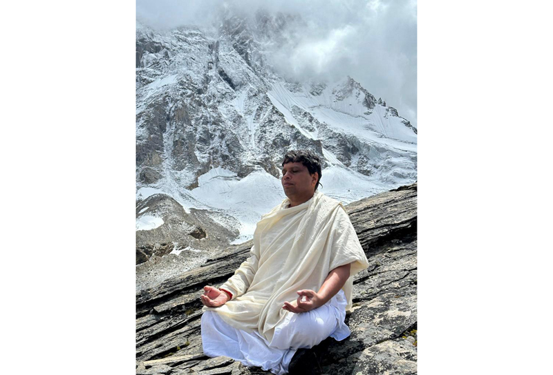 Acharya Balkrishna meditating at an iceberg in Himalayas.