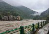 Flooded Teesta river in north Sikkim, Wednesday, Ocyt. 4, 2023. A sudden cloud burst over Lhonak Lake in North Sikkim has resulted in a flash flood in the Teesta River in Lachen valley, which was compounded by the release of water from a dam, leading to 23 army personnel being washed away, camps and vehicles being submerged.