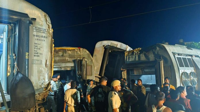 Police and locals at the site of the accident after six bogies of North East Express derailed near Raghunathpur railway station in Buxar district
