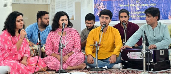 Artists performing during concluding session on two-day seminar on role of KPs in promoting Kashmiri literature and language at Jammu on Tuesday.