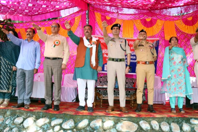 Dignitaries, staff and students taking pledge during drug awareness campaign organised at Government school at Bhalwal on Tuesday.