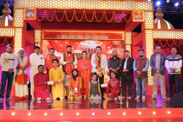 Guests and organizers with the preliminary round winners on third day of Devotional Song Competition at Katra.