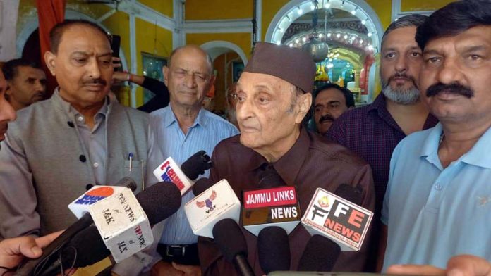 Dr Karan Singh talking to media persons during his visit to Shri Ranbireshwar Temple at Jammu on Thursday.