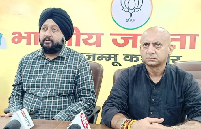 BJP Kissan Morcha leaders talking to reporters at Jammu on Saturday.