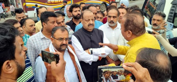 Senior BJP leader Devender Singh Rana interacting with people.