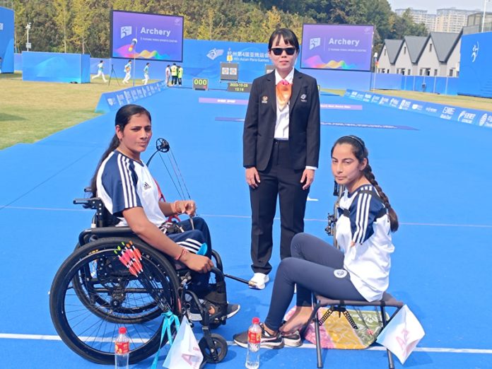 Para Archers, Sheetal Devi and Sarita posing after winning Silver Medal in Women's Doubles Compound Event on Wednesday.