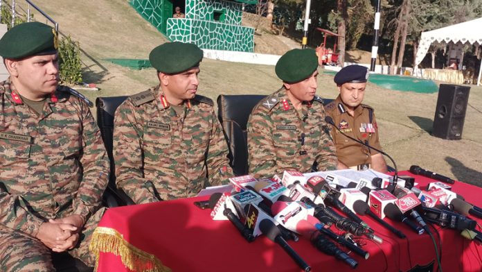 GOC Maj Gen Girish Kalia and other officials at a press conference in Kupwara on Friday. — Excelsior/Aabid Nabi