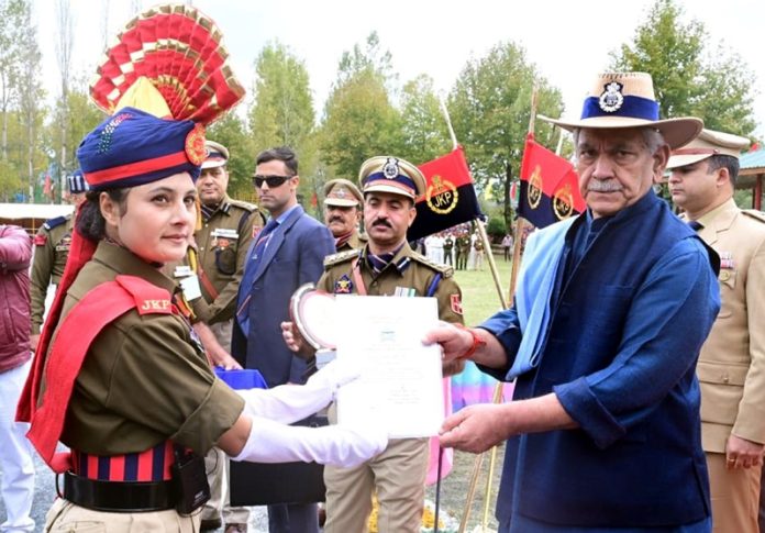 LG Manoj Sinha presenting a certificate to new recruit at Sheeri, Baramulla on Wednesday. -Excelsior/Aabid Nabi