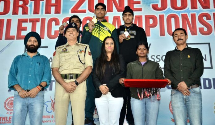 Winners of North zone Athletics championship posing with the chief guests.