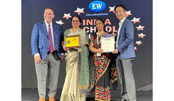 Rohini Aima - Principal Cum Vice-Chairperson accompanied by Sonakshi Anand - Director Operations Jammu Sanskriti School receiving award after achieving Rank No 1 in J&K UT at New Delhi.