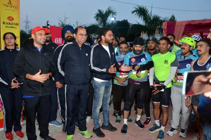 DCJammu, Sachin Kumar Vaishya along with SSP, Jammu Vinod Kumar interacting with athletes during Duathlon 70.3 event at Jammu.