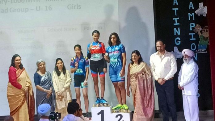 Saanvi Grover (VIII-B) and Pratyaksha Gupta (X-B), both students of Delhi Public School Jammu posing with medals.