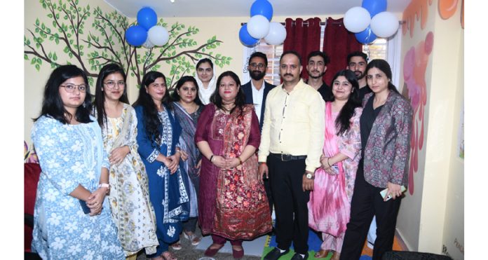Dignitaries posing for a group photograph during a medical camp at Jammu on Monday.