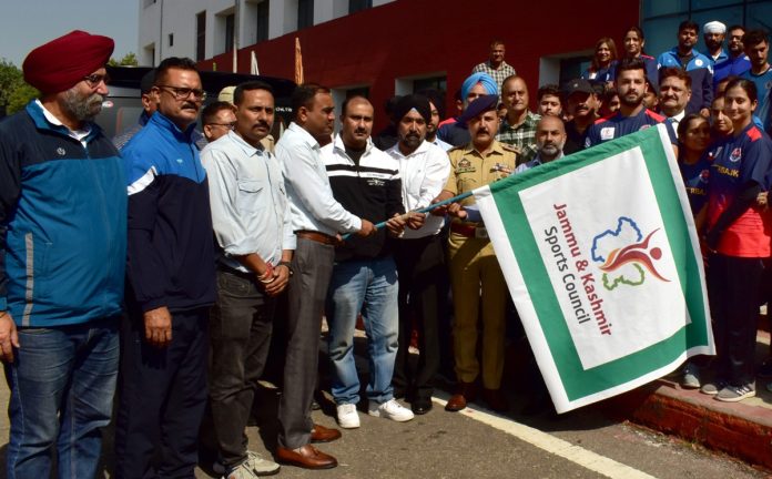 Divisional Commissioner Jammu, Ramesh Kumar flagging off J&K contingent for 37th National Games on Wednesday.