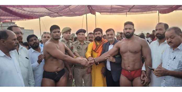 Wrestlers being introduced before the main bout at Domana on Friday by dignitaries.