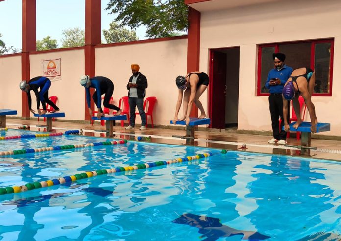 Swimmers in action during Inter District UT level competitions on Friday.