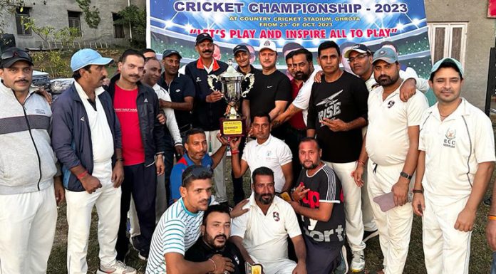 Honey Buzzy Bee Royals cricket team posing with trophy on Thursday.
