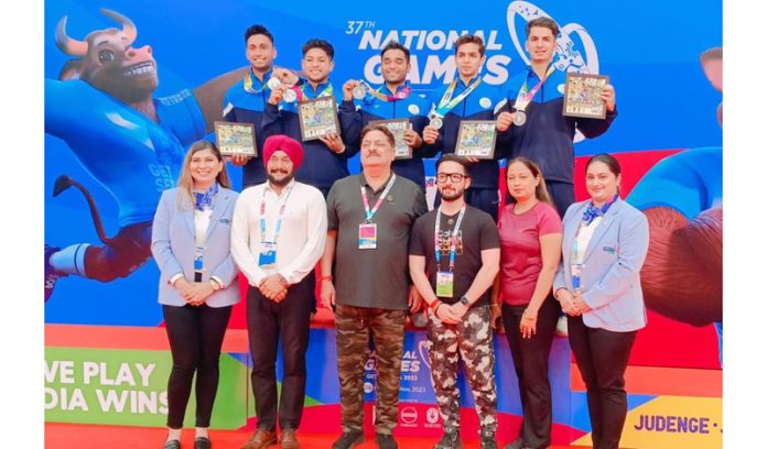Gymnasts posing with Er Kiran Wattal and team management at National Games, Goa on Friday.
