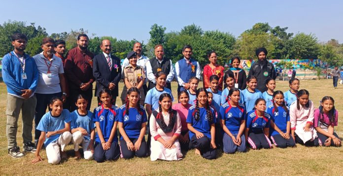 Students of R.M Public School posing with dignitaries.