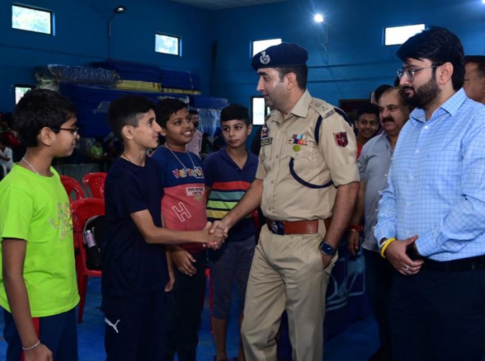 Additional Superintendent of Police (Add.SP), Udhampur Anwaar Ul Haq interacting with chess players.