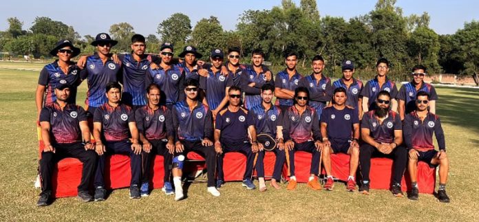 Under-19 cricket team of J&K posing for photograph.