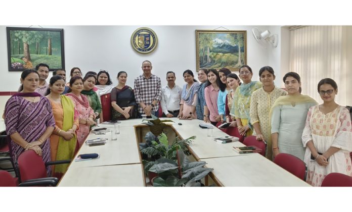 Director and Principal MIER Prof Adit Gupta posing with staff members on conclusion of an FDP.
