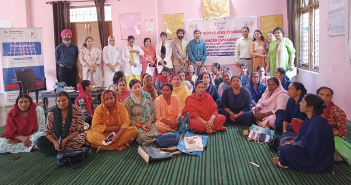 Women associated with Umeed Group participating in a cancer awareness program in Gaink Panchayat of Block Kot Bhalwal in Jammu on Monday.