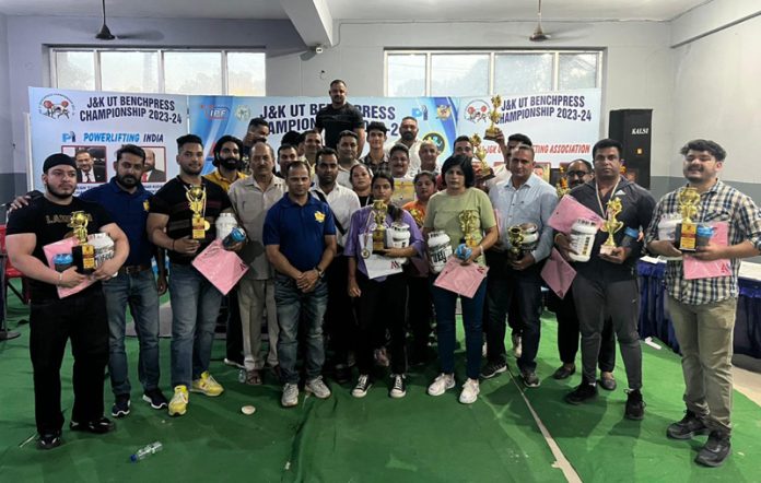 Powerlifters posing with dignitaries on Tuesday.
