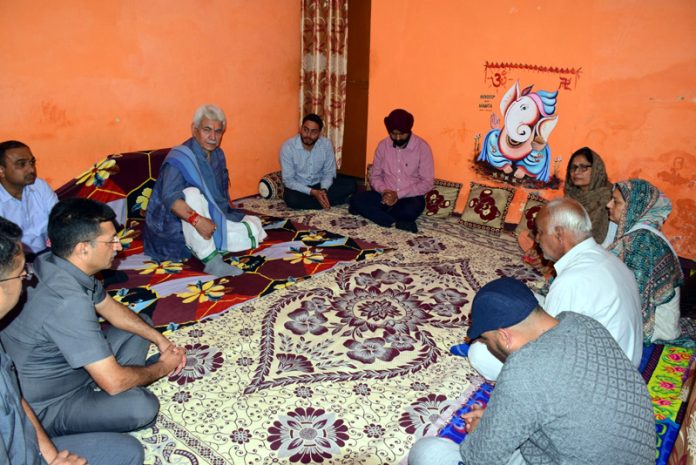 Lt Governor Manoj Sinha meeting the family members of SSF Personnel.