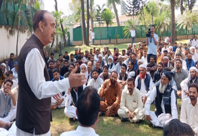 DPAP chairman Ghulam Nabi Azad interacting with a delegation of STs in Jammu on Wednesday.