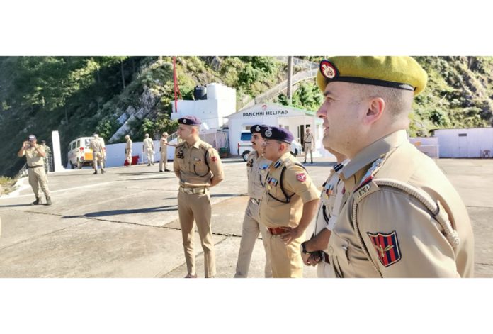 IGP Jammu, Anand Jain, flanked by other police officers, at Panchhi Point Helipad in Katra on Wednesday.