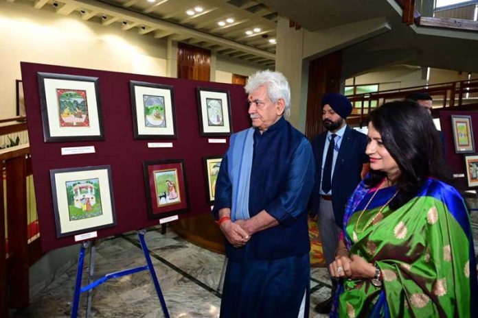 LG Manoj Sinha during visit to art exhibition at Srinagar on Friday.